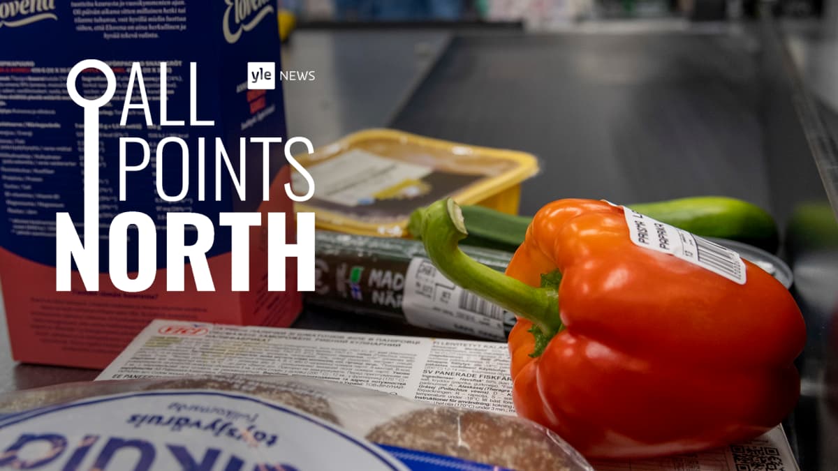 All points north-logo and groceries on conveyor belt.