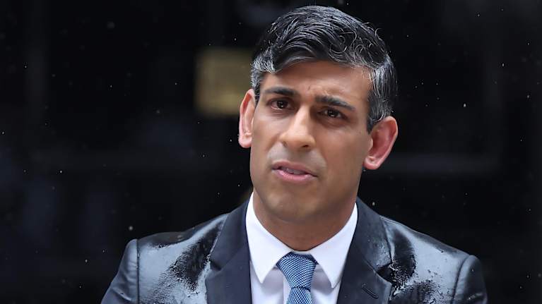 British Prime Minister Rishi Sunak announced snap elections outside his official residence on May 22.