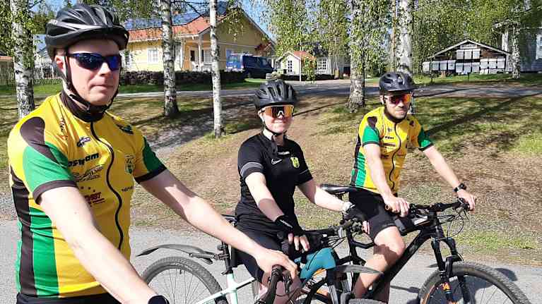 Tre cyklister.