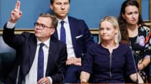 Photo shows Prime Minister Petteri Orpo (NCP) and Finance Minister Riikka Purra (Finns) pictured in parliament.