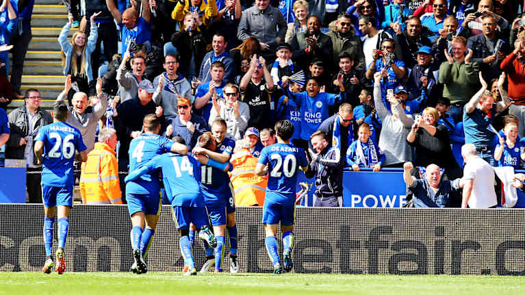 Leicester players celebrate a goal.