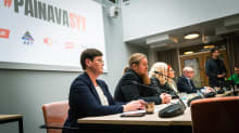 Photo shows members of the Central Organisation of Finnish Trade Unions SAK at a press conference.