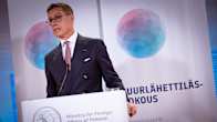 President Alexander Stubb behind a podium.
