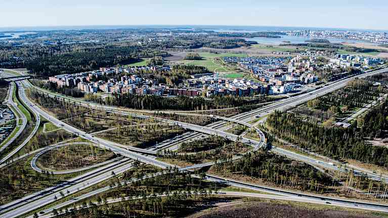 The picture shows an aerial view of a highway overpass in Malmi, Helsinki.