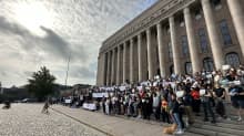 Photo shows a protest organised by the 'Specialists in Finland's group outside Finland's parliament building in September.
