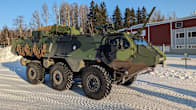 Photo shows a 6x6 armoured vehicle.