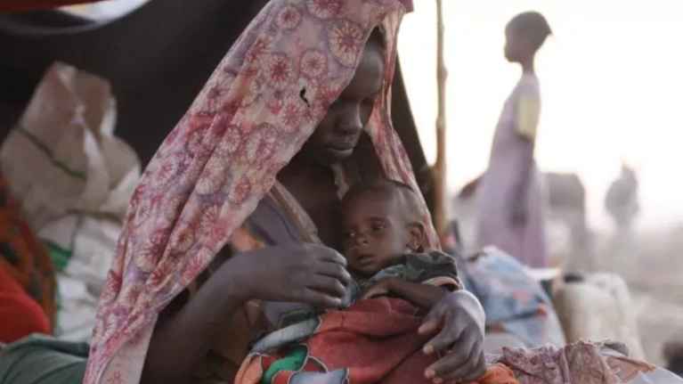 Mother escaped from El-Fasher with her child 9.7.2025.