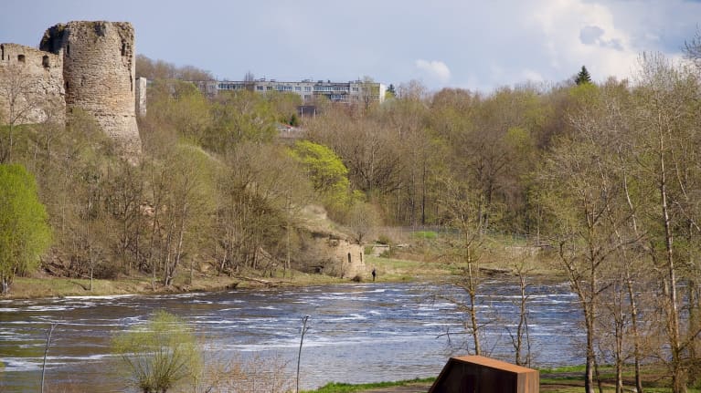 A river flow through a spring landscape. 