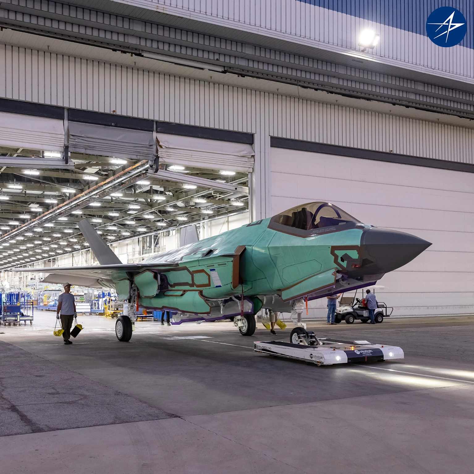 F-35 fighter jet in unfinished turquoise coating
