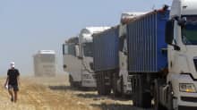 Ukrainalaiset viljelijät korjaavat viljaa Odessan alueella Etelä-Ukrainassa 23. kesäkuuta.