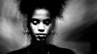 Tumiin pukeutunut henkiro.