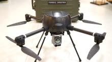 Photo shows a drone with attached camera.