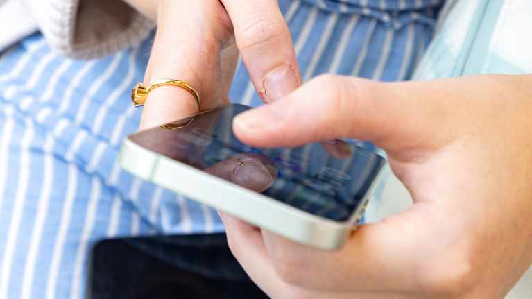 A man browsing his phone.