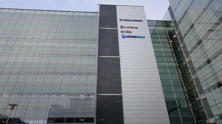 Glass and steel building.