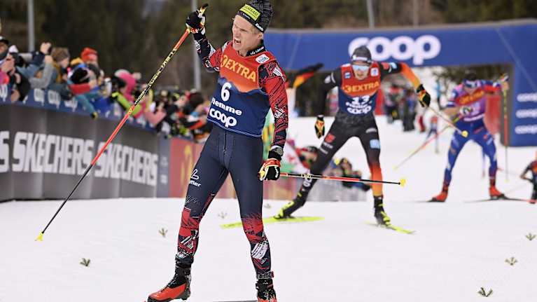 Mika Vermeulen celebrating at the summit of Alpe Cermis in 2025.
