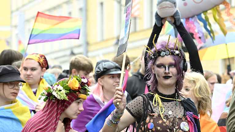 Characters in a Pride parade in central Helsinki.