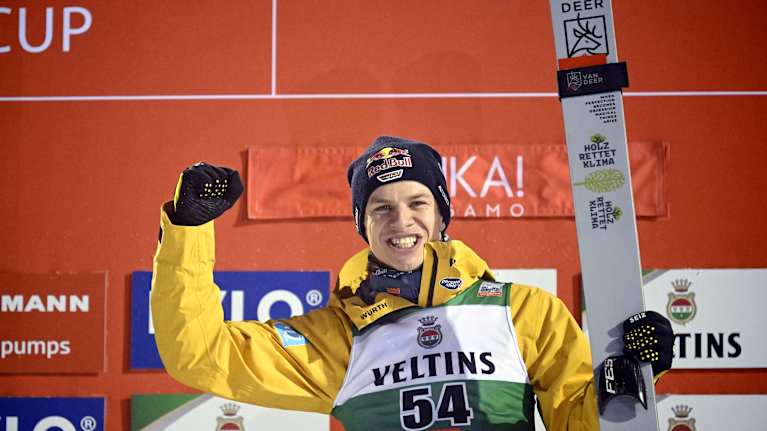 Image 16: Andreas Wellinger cheers victory in Ruka.