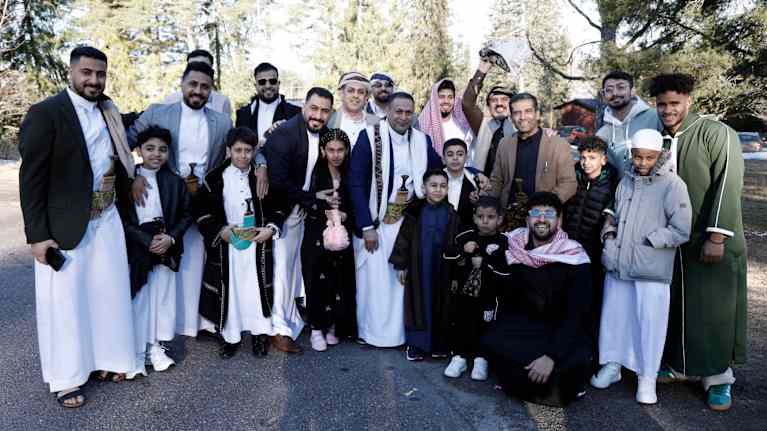 A happy crowd celebrating the end of Ramadan.