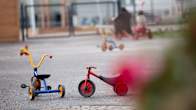 Toys strewn around in a playground.