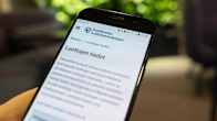 A smartphone screen showing the Tax Administration's positive credit register website.