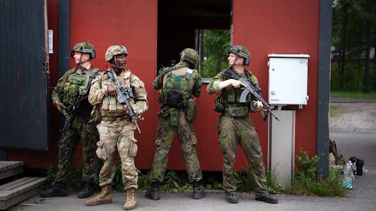 U.S. and Finnish forces work together during a military exercise.