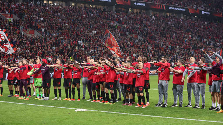 Leverkusen's fans celebrate their place in the Europa League final.