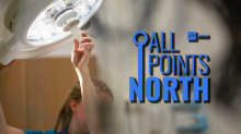 Photo of healthcare worker adjusting a hospital examination lamp, featuring the All Points North podcast logo.