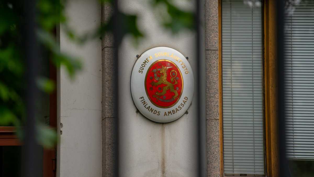 Closeup of Finnish embassy sign on building in Moscow