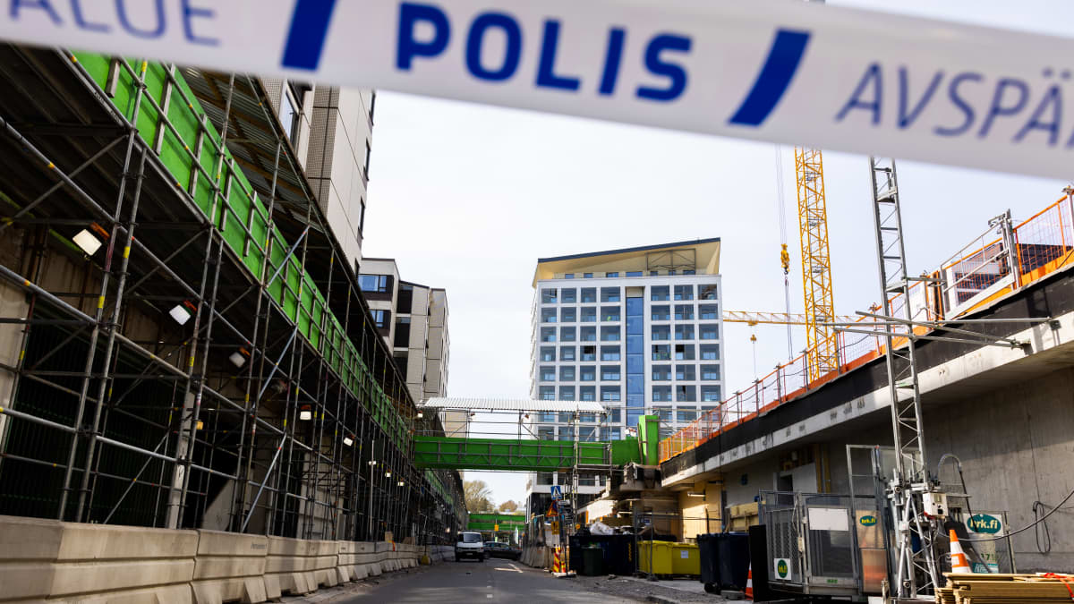 Police barricade tape blocking the area of a footbridge collapse in Tapiola, Espoo.
