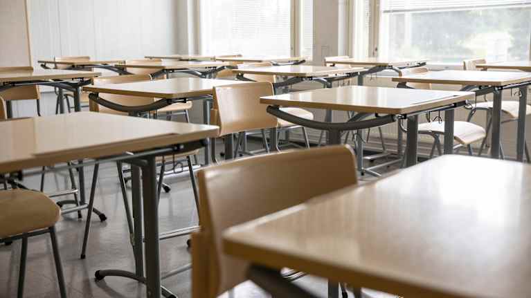 Desks in a classroom. 