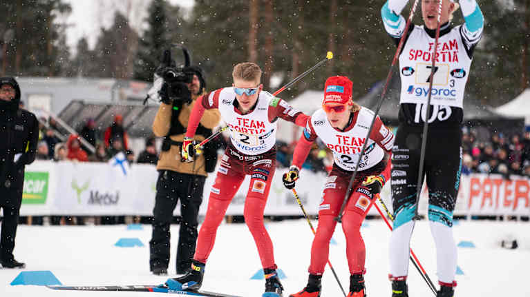 Image 2: Remi Lindholm and Miro Karppanen at the communication exchange area.