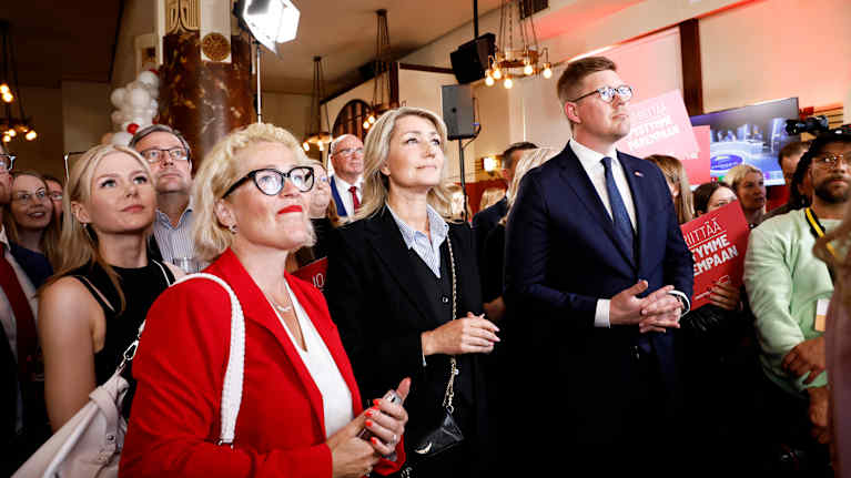 Miapetra Kumpula-Natri, Maria Guzenina and Antti Lindtman at an election observation party.