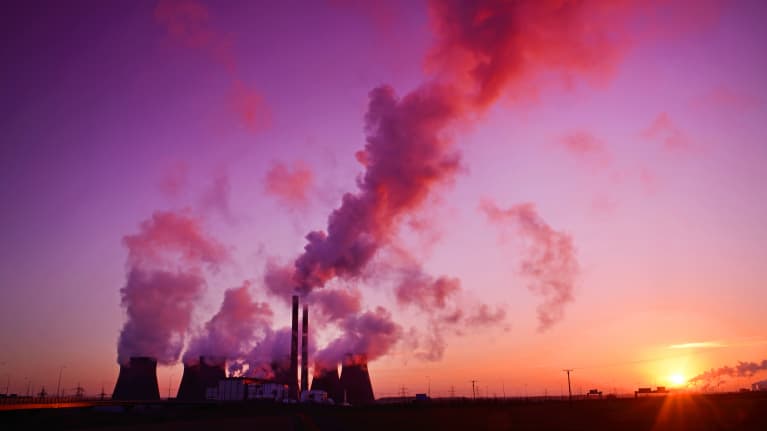 A coal-fired powerplant at sunrise.