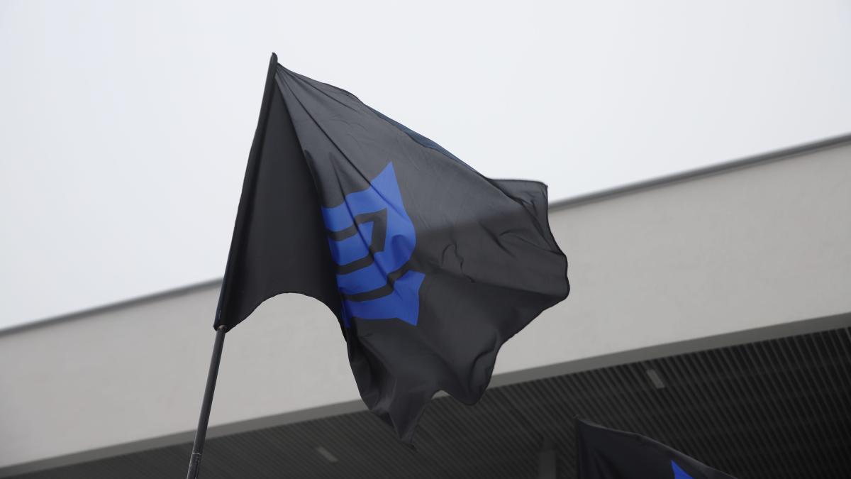 The Blue-Black Movement's logo on a flag.