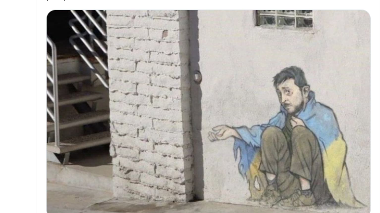 Graffiti jossa Ukrainan presidentti kerjää.