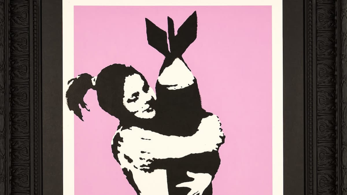 Banksy: Bomb hugger.