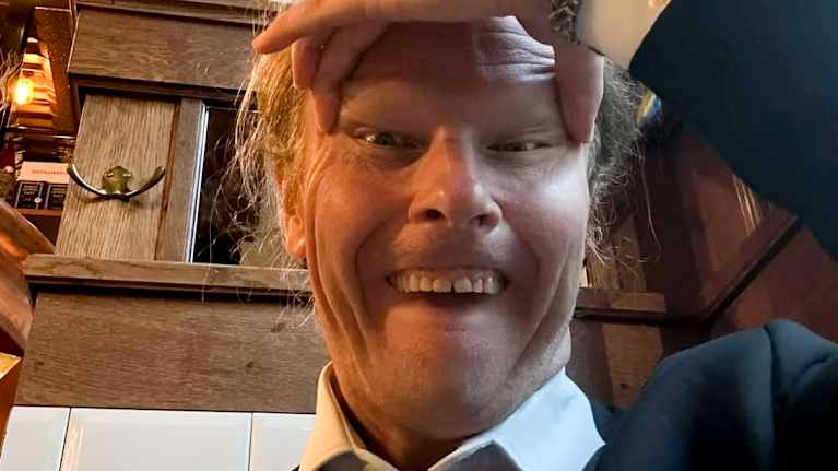 MP Juho Eerola&rsquo;s profile picture on Facebook. The text reads "Juho Eerola updated his profile picture. I am Sarah!" In the picture, he is squinting.