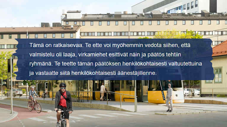 Leike sähköpostista ja taustalla raitiotien havainnekuva.