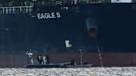 Officials boarding the Eagle S tanker.