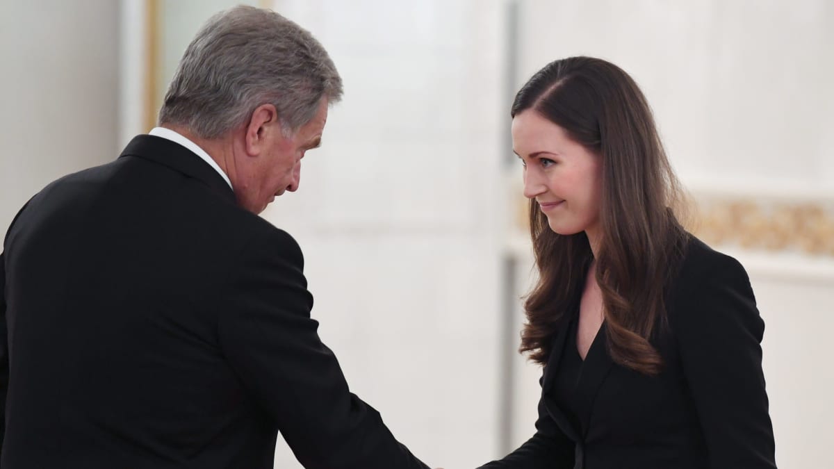 President Sauli Niinistö och statsminister Sanna Marin på presidentens slott den 10 december 2019.