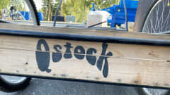 Qstock logo kärryissä.