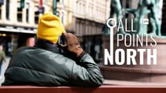 APN podcast logo featuring man on phone in downtown helsinki Arttu Timonen Yle