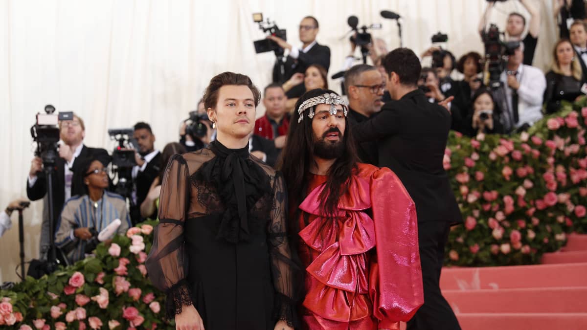 Harry Styles (L) and Alessandro Michele (R) arrive on the red carpet for the 2019 Met Gala, the annual benefit for the Metropolitan Museum​ of Art's Costume Institute, in New York, New York, USA, 06 May 2019. Alessandro wears Red metallic shirt and trousers by Gucci.