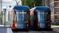 Two trams side by side in Tampere. 