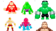 Eleven colourful toys on a white background.