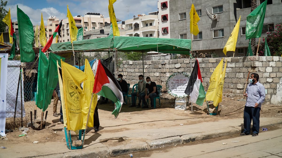 Muistotilaisuus Israelin ilmaiskussa menehtyneen perheen muistoksi Gaza Cityn keskustassa.