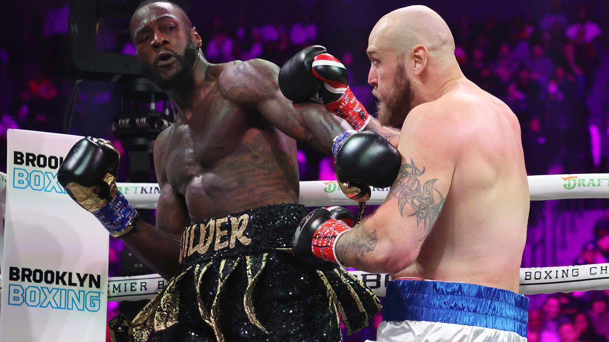 Deontay Wilder ja Robert Helenius nyrkkeilevät.