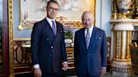 Two men - Alexander Stubb and King Charles - in suits pose for the camera.
