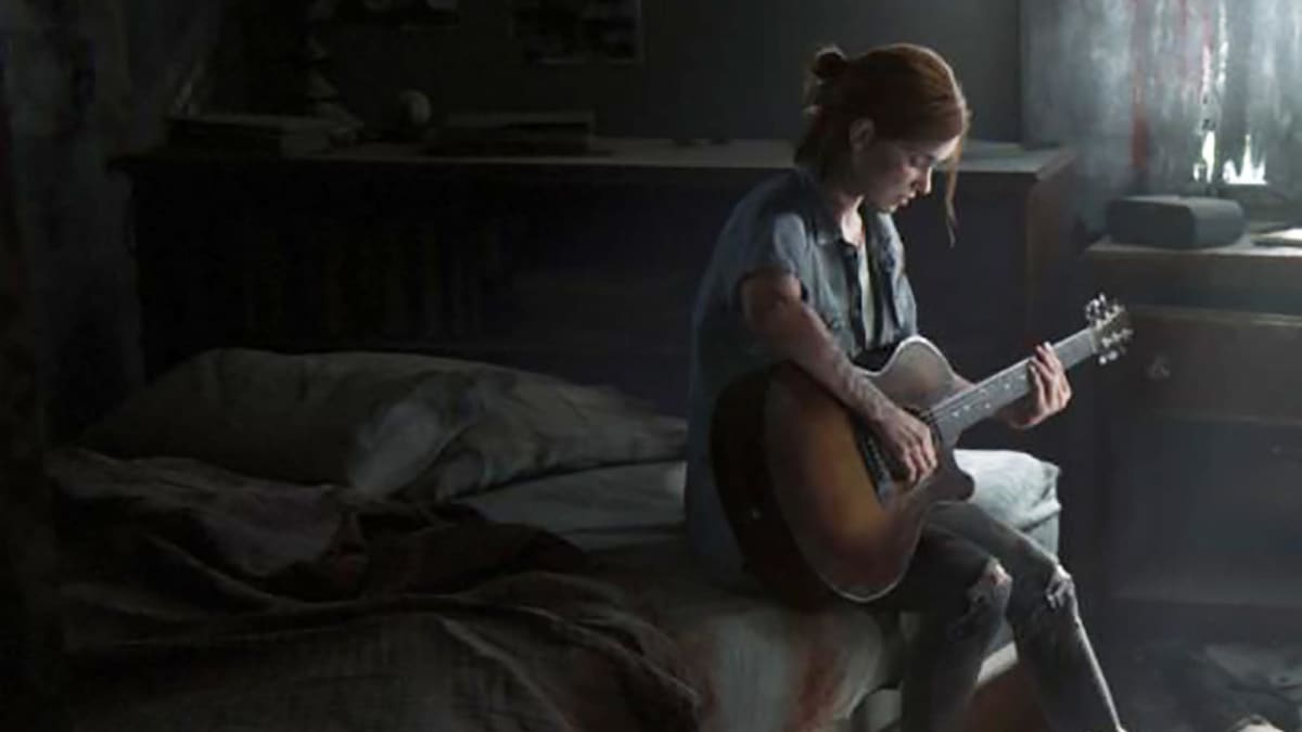 Nuori videopelihahmo soittaa kitaraa sängyn laidalla, kun maassa makaa ruumis verilammikossa.