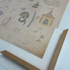 Vanha luonnos, jossa on Muumi-hahmoja.